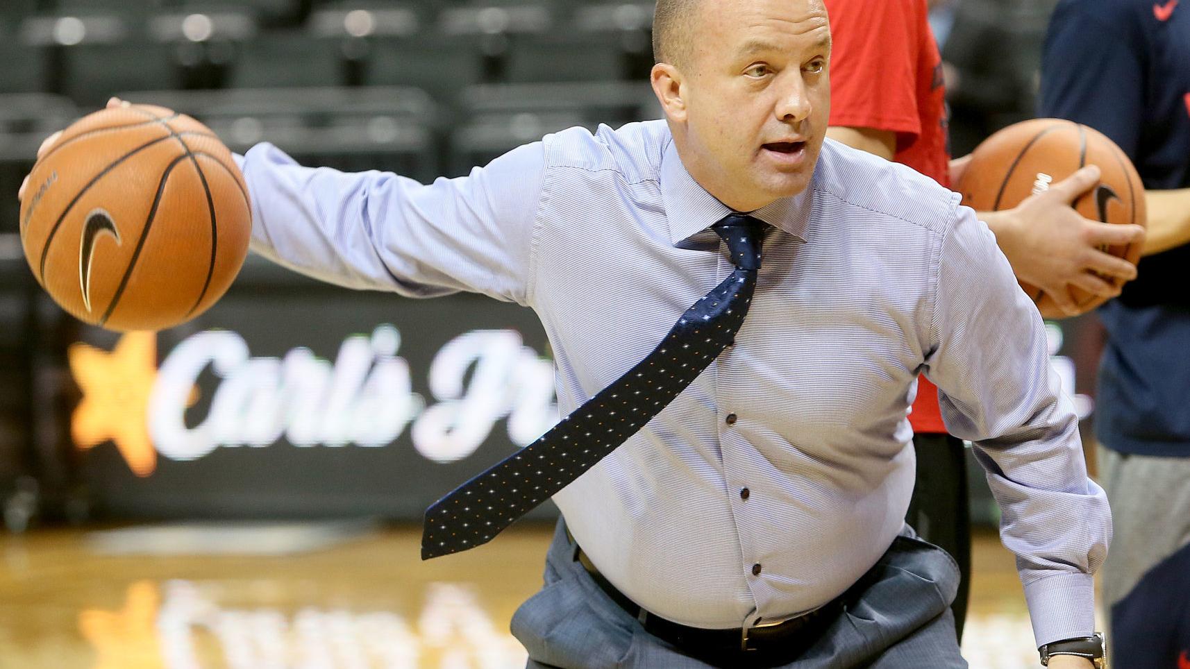 Who is Mark Phelps? Here are 8 things to know about the suspended Wildcats assistant